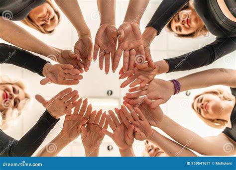 Team of People Holding Hands. Group of Happy Young Women Holding Hands ...