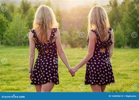 Two Lesbians Sisters Twins Beautiful Curly Blonde Young Woman in ...