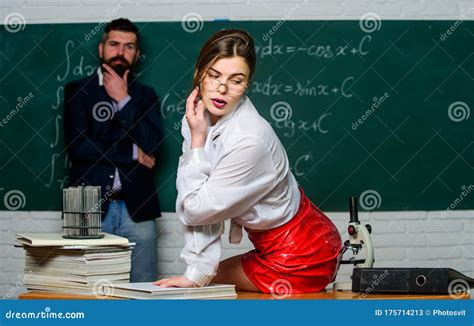 Learning To Seduce. Woman Back To Class. Sensual Woman Teacher with ...