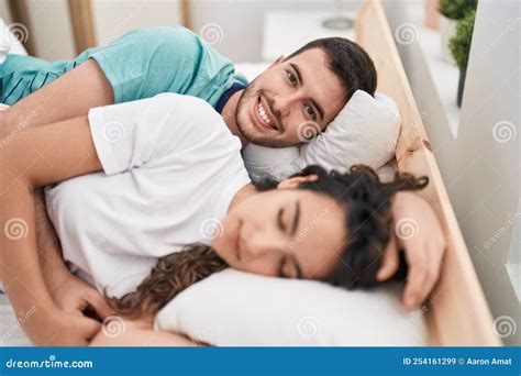 Young Hispanic Couple Lying on Bed Sleeping at Bedroom Stock Image ...