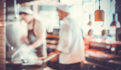Premium Photo | Blurred background : group of chefs cooking in the kitchen