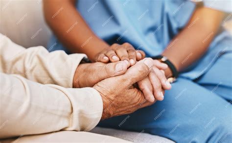 Premium Photo | Nurse patient and holding hands in nursing home for ...