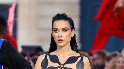 Katy Perry 'is trying very, very hard to get attention' in 'provocative' Paris outfits but looks ...