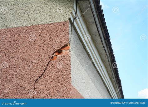 A Serious Stucco Crack on the Corner of the House Near the Rooftop ...
