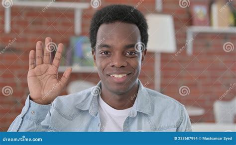 Portrait of African Man Waving To Say Hello Stock Photo - Image of ...