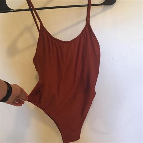 Burnt orange one piece swimsuit with adjustable... - Depop