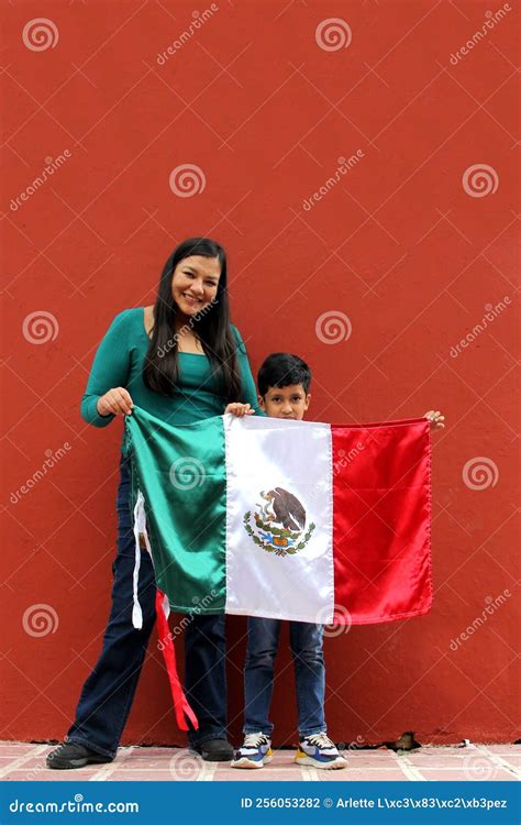 Latin Mexican Mom and Son Show the Flag of Mexico Very Proud of Their ...