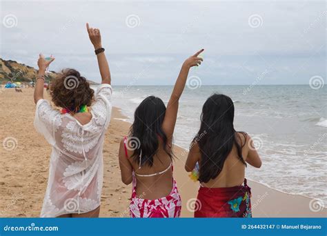 Mature Woman with Two Young and Brunette South American Women, Wearing ...