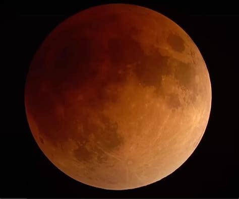 Here's Why Tonight's Moon Appears Orange, Explained