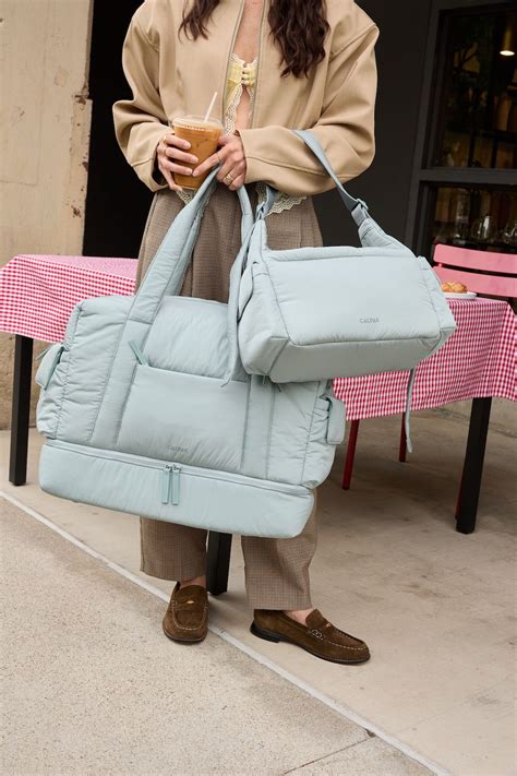 Baby Travel Essentials - Diaper Bags, Changing Pads & More | CALPAK in ...