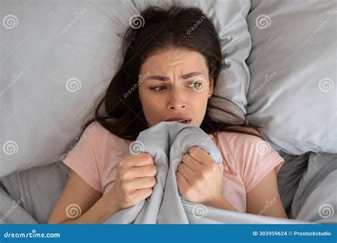 Scared Young Woman Lying in Bed Be Afraid of Sounds or Unable To Get To ...