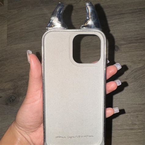 Urban Sophistication Devil horn metallic phone case... - Depop