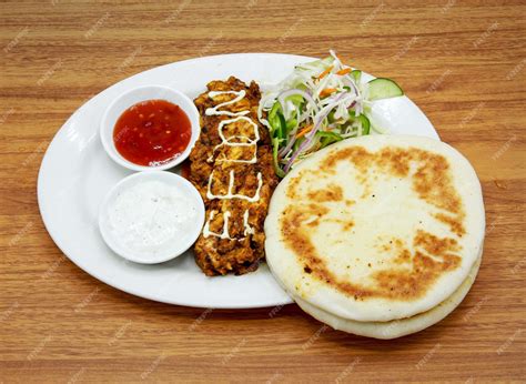 Premium Photo | Chicken shawarma platter with salad chilli sauce mayo ...