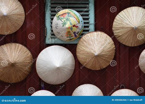 Vietnamese Non La Hats Hanging on Wall Stock Photo - Image of symbol ...
