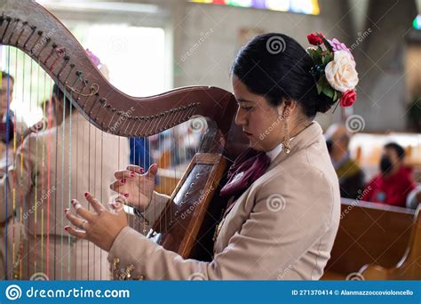 Mariachi Woman Harpist in a Chirch Fun, Hispanic Female Playing Harp ...