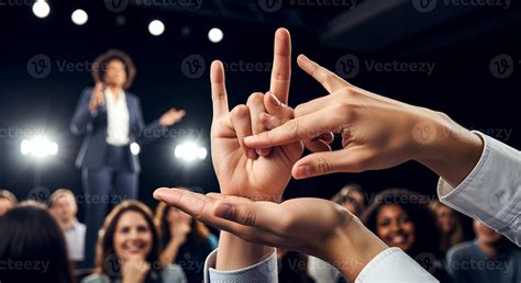 Sign language interpreter at a conference, translating speech. 70866214 ...