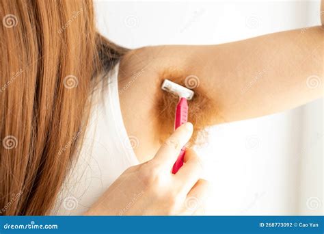 Female Armpits with Red Hair. Woman with Unshaven Hairy Armpits and Shaving with Razor. Female ...