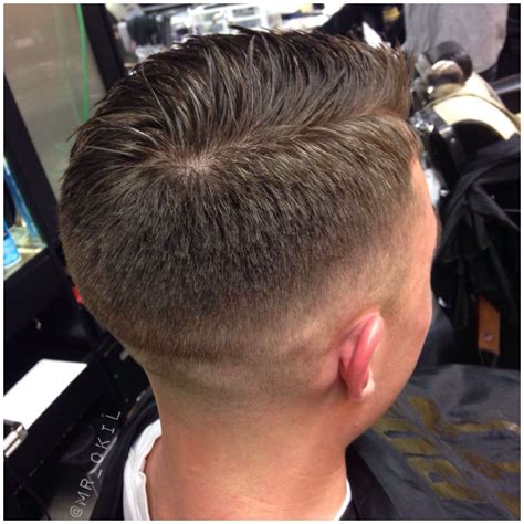 Bald mid fade with transition to the left!! Subtle scissor work can go ...