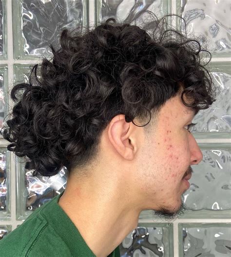 40 Ultra Cool Curly Taper Fade Haircuts for Men in 2025