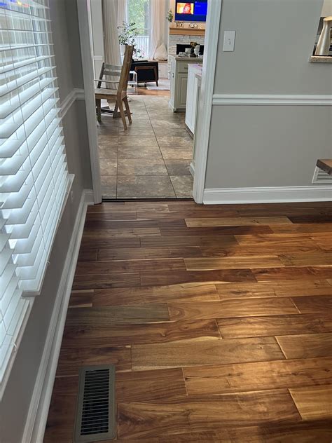 Tile laid on top of tile?! : r/Flooring