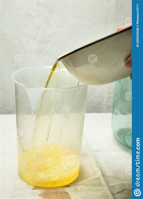 The Process of Making Limoncello Lemon Liqueur at Home. Stock Photo ...