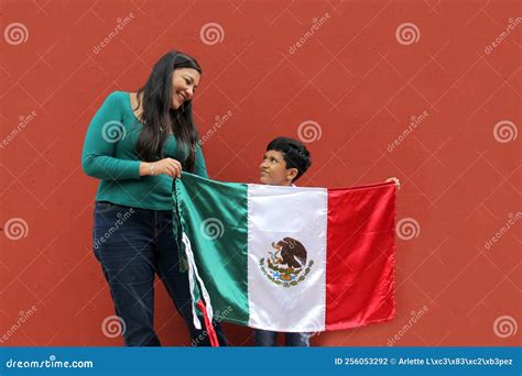 Latin Mexican Mom and Son Show the Flag of Mexico Very Proud of Their ...