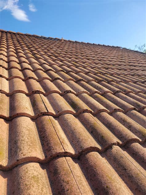 Moss removal from Spanish tile roofs. : r/pressurewashing
