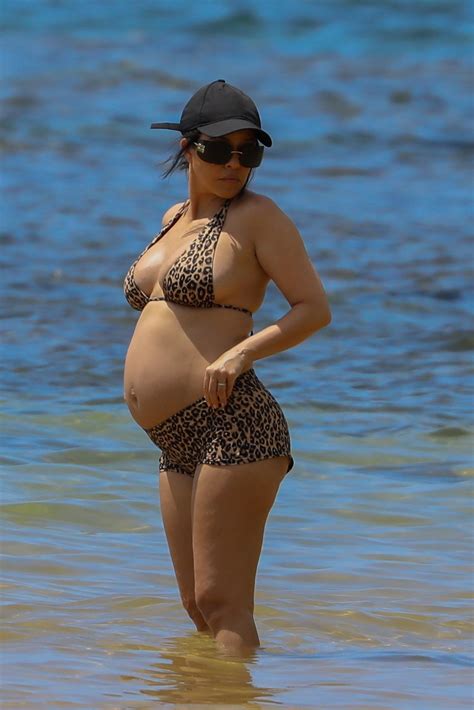 Kourtney Kardashian shows off baby bump in leopard bikini in Hawaii