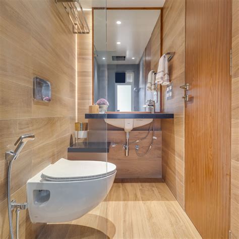 Compact Wooden Bathroom Design With Retangular Mirror - 7X6 Ft | Livspace