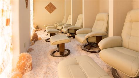 Peaceful salt therapy room with natural salt walls