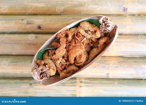 Crispy Fried Chicken Skins Served on Dry Leaves Bowl Stock Image ...