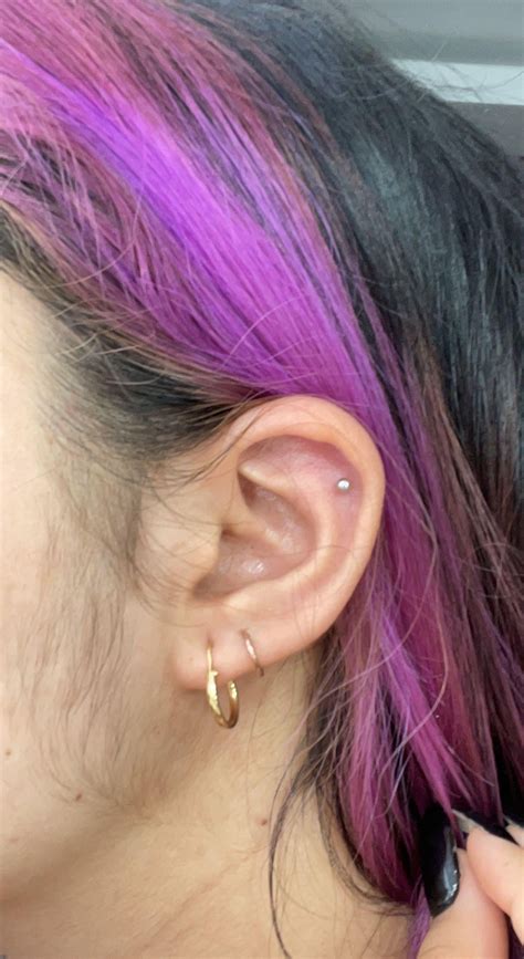 Is my upper lobe pierced too low? : r/piercing