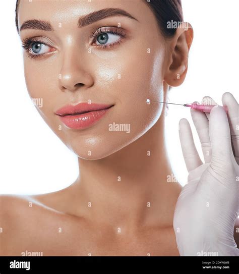 Thread face lift, using mesothreads. Needle with mesothreads near beautiful woman face, isolated ...