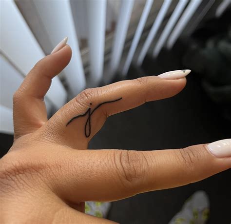 Ring Finger Tattoos For Women
