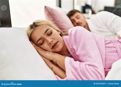 Young Caucasian Couple Sleeping Lying on the Bed at Home Stock Image ...
