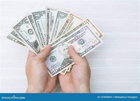 People With Money In Hand