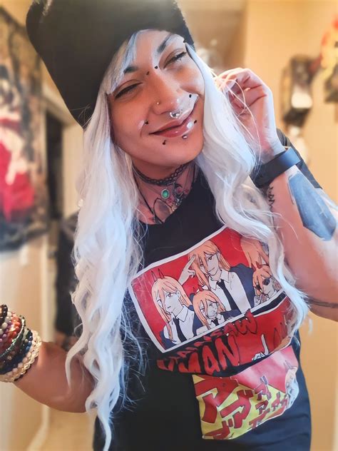 Gothic Latina pinup, A gothic pinup boldly adorned woman with a large, intricate tattoo that ...