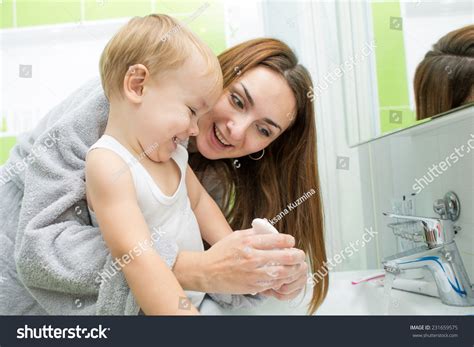 Mom and son bathroom Images, Stock Photos & Vectors | Shutterstock
