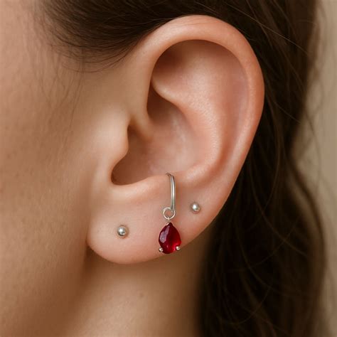 Anti-Tragus Piercing Guide: Pain, Healing, Jewelry & Aftercare ...