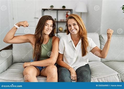 Mother and Daughter Together Sitting on the Sofa at Home Strong Person ...