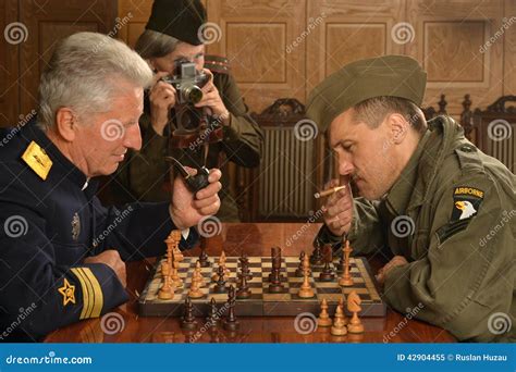 Military Mature General Playing Chess with Soldier Stock Image - Image ...