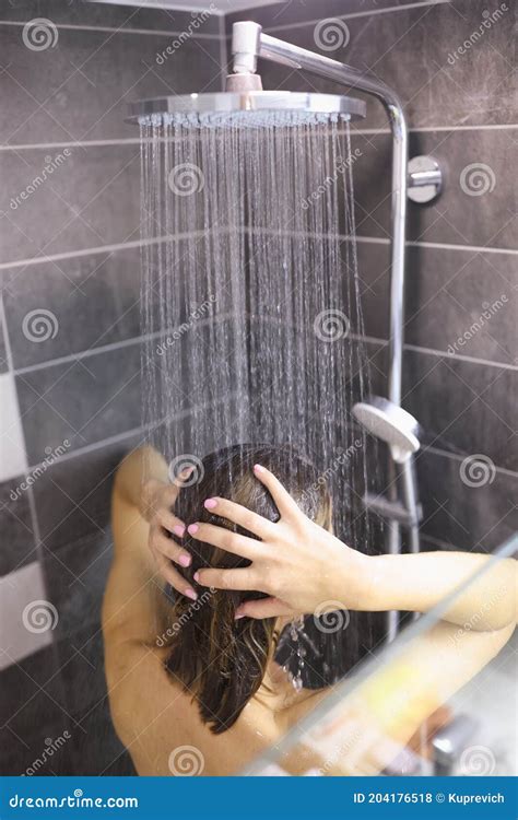 Naked and Wet Woman Wash Her Hair Under Shower in Bathroom. Stock Photo ...