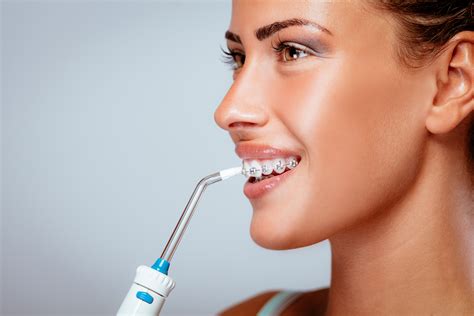 The Plaque Battle — Water Flosser vs Regular Floss | SMILE! Advanced Dental Center | General ...