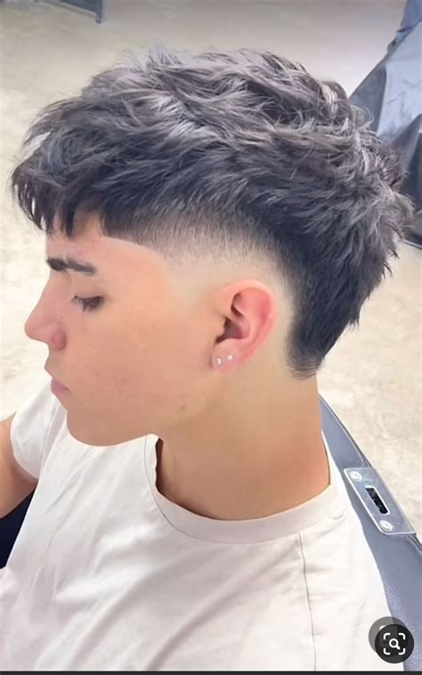 Mid Taper Fade with Textured Fringe