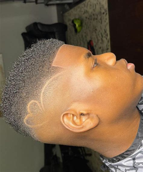 Fade w a heart design. | Heart design, Fade haircut, Design