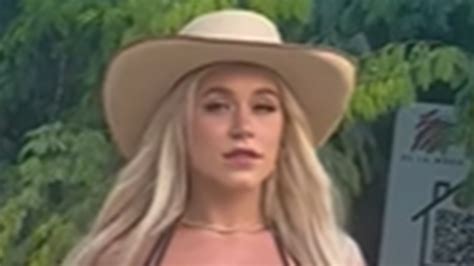 OnlyFans star and boxer Elle Brooke strips down to barely-there bikini, cowboy hat and boots for ...