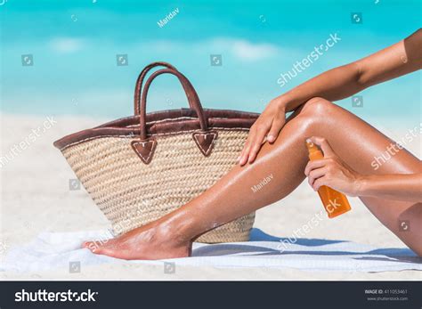 Sunscreen Suntan Lotion Spray Bottle Woman Stock Photo 411053461 ...