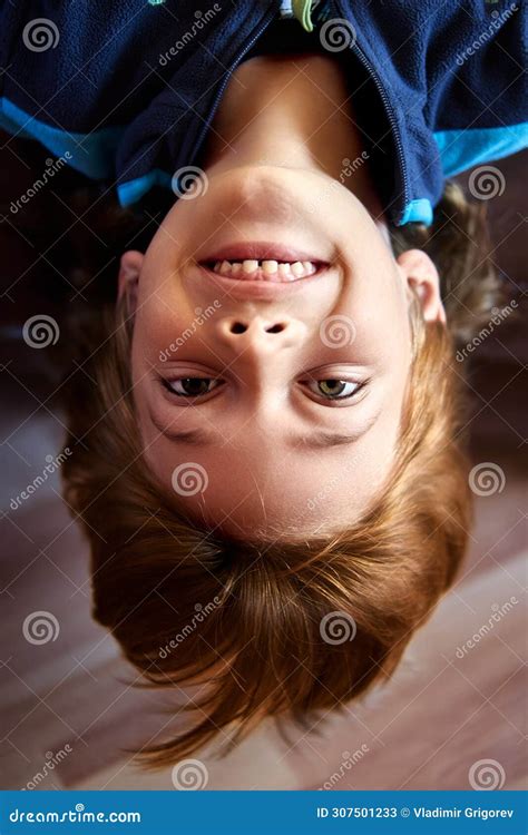 Young Boy with Brown Hair and Big Smile, Upside Down. Stock Image ...