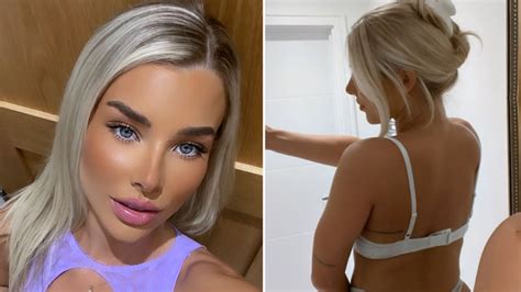 Glamorous footballer Madelene Wright strips down to underwear and bares bum in cheeky mirror ...