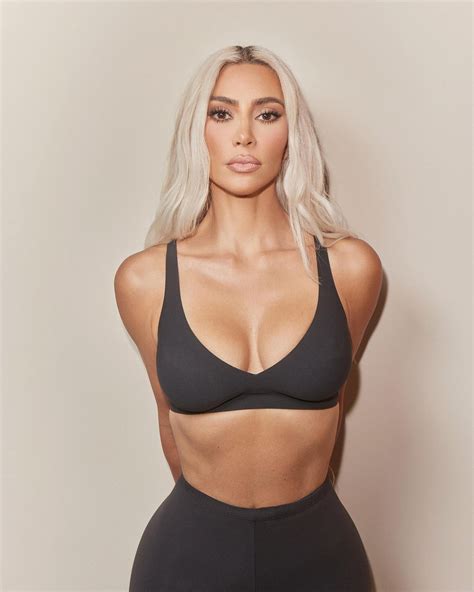Kim Kardashian stuns as she shows off her bare boobs in see-through ...
